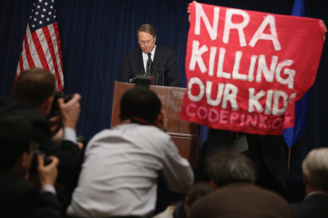 The NRA press conference is interrupted by protesters.