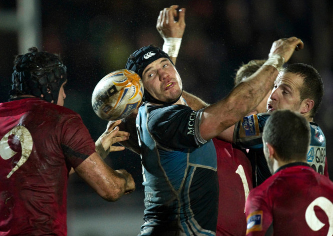 Glasgow Warriors Tim Swinson (centre) can only look as he drops the ball during the first leg on Friday.