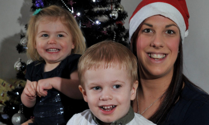 Amy Muir, with children Madelyn (2) and Connor (3), launched a Facebook appeal after people in Stonehaven were left homeless when the town was hit by severe flooding.