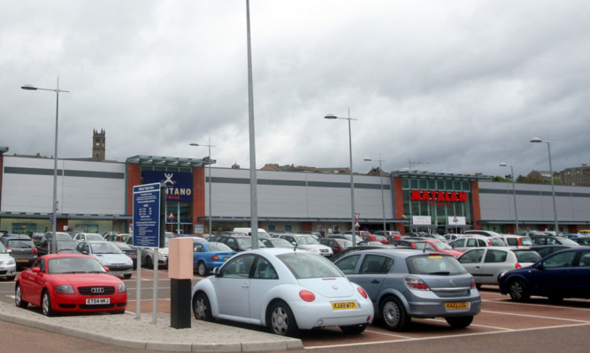 The retail park car park.