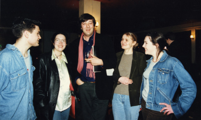 Stephen Fry with students at Dundee University in 1997.