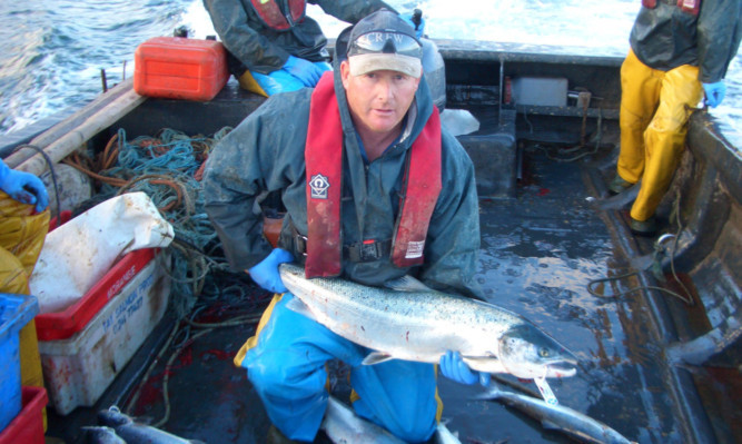 David Pullar with a Scottish wild salmon, which is to get special EU Protected Food Name status.