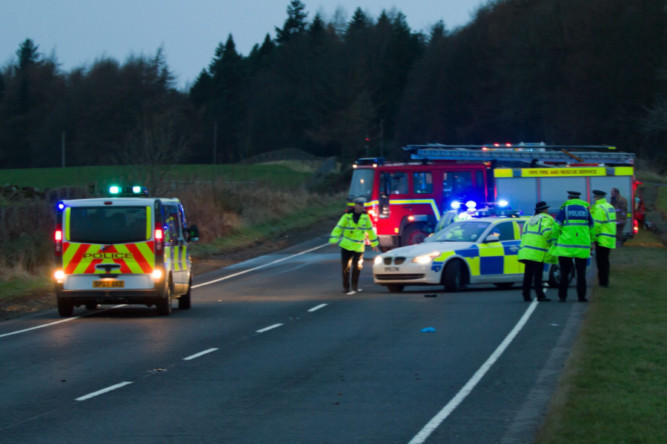 Emergency services work at the scene of the accident.