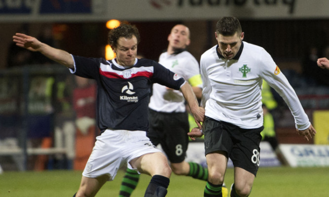 Matt Lockwood tackles Celtic's Gary Hooper during Wednesday's match.