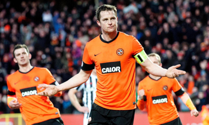 Jon Daly sees little to celebrate despite levelling for United from the penalty spot.