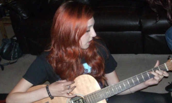 Kayla loved music and enjoyed playing the guitar and using her creativity to develop her own unique style.