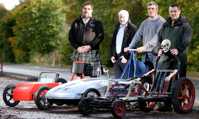 Teams are gearing up for this weekends Brechin cartie race. From left: Campbell Archibald - Sales Director of Alba Power, Derek Harper - BRAVO Brechin, Ian McIntosh and Gavin Brymer - Chair of the Cartie Group.