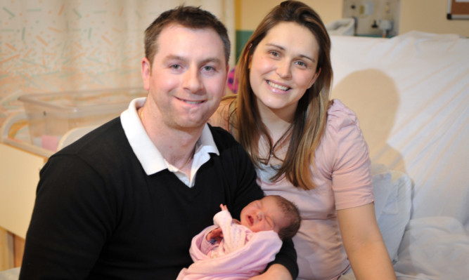 Greg and Michelle Burns with baby Ellie.