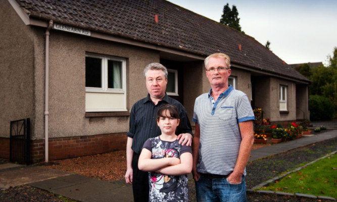 From left: is George Donaldson and daughter Caitlin Donaldson and their neighbour Billy Goodbrand.