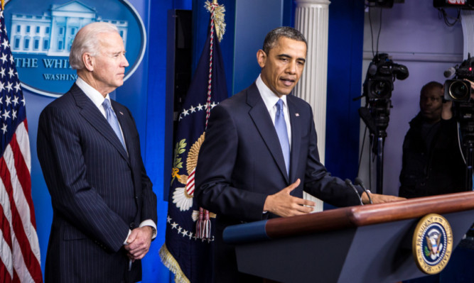 President Obama and Vice-President Joe Biden in the White House briefing office.
