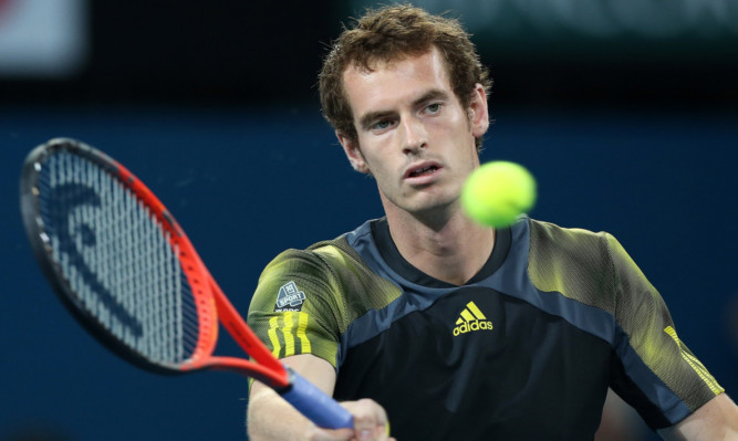 Andy Murray wobbled in the second set but still cruised to victory against John Millman in Brisbane.
