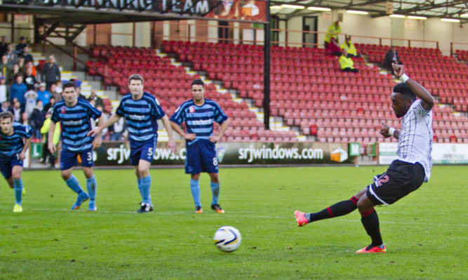 Chigozie Ugwu takes the penalty that was saved by Rab Douglas.