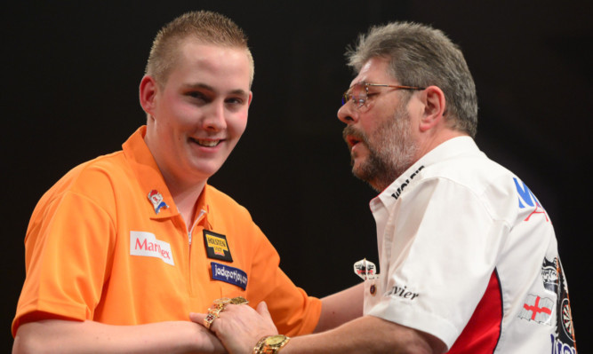 Martin Adams congratulates Jimmy Henriks on his victory.