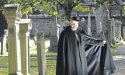 Gary Knight in costume as alleged bodysnatcher John Larg in Greyfriars graveyard, Perth.