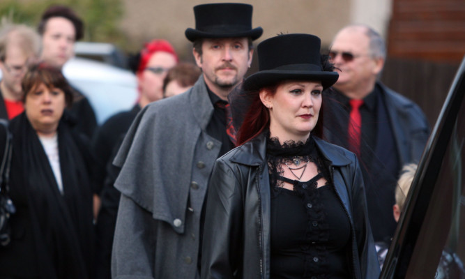 Mourners respected Kayla's wish for a Gothic-themed celebration of her life.