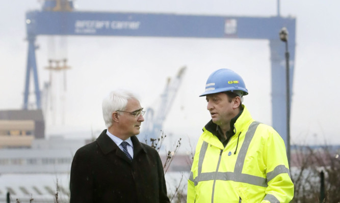 Alistair Darling with trade union leader Raymond Duguid at Rosyth.