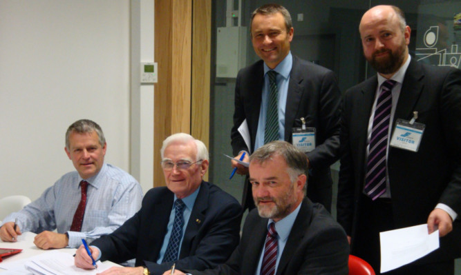 Front, from left  David, Hamish and Richard Tough. Behind them are advising lawyers George Frier (left) and Ewan Hall.