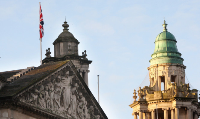 The Union flag flying over the city hall.