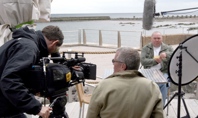 The Come Dine With Me crew filming in Dundee on a 2008 visit to Tayside.
