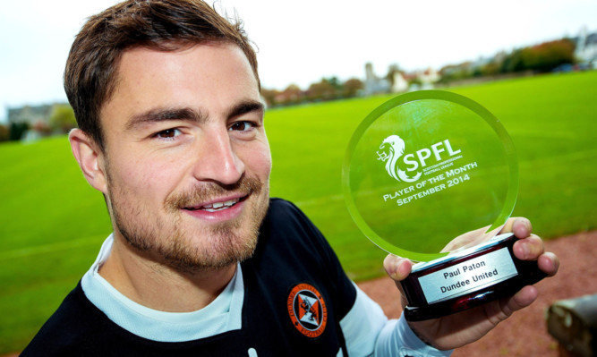 Paul Paton with his recent award.