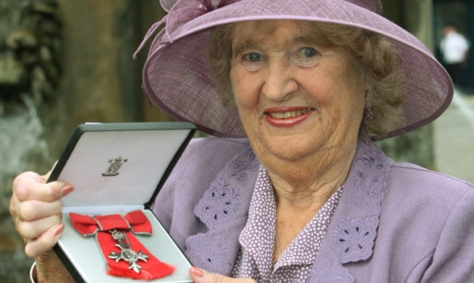 Mrs Watters with her MBE.