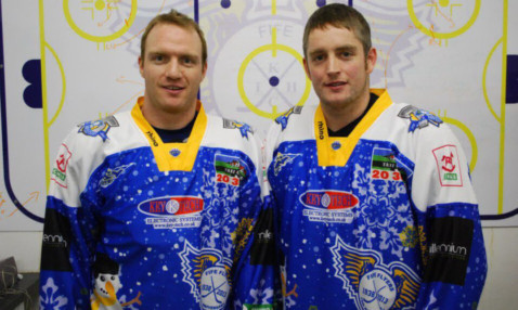 Derek Keller (left) and Jamie Wilson, modelling the shirts.