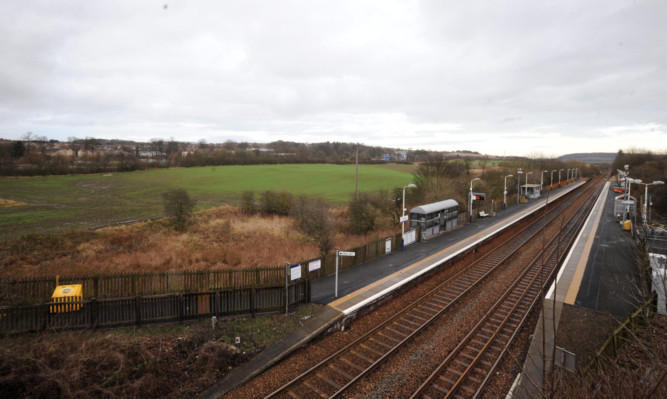 Rosyth train station and the land earmarked for the project.
