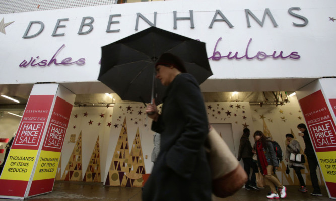 Under the weather: Debenhams profits fell more than 20% last year.