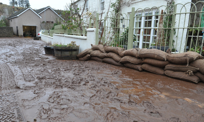 Some of the mess left on Bridgefield Terrace in Stonehaven after the River Carron burst its banks.