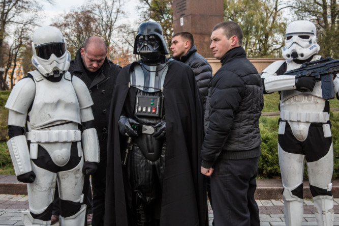 KIEV, UKRAINE - OCTOBER 24: Representatives of the Internet Party of Ukraine dressed as characters from Star Wars, including parliamentary candidate Darth Viktorovich Vader (C), on October 24, 2014 in Kiev, Ukraine. The country's parliamentary elections, scheduled for Sunday, are seen as key to President Petro Poroshenko's ability to advance his agenda, stabilize the economy, and end fighting in the country's east. (Photo by Brendan Hoffman/Getty Images)