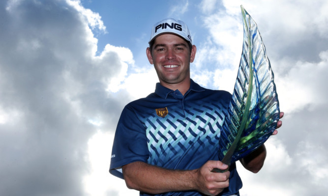 Oosthuizen with the Volvo Champions trophy.