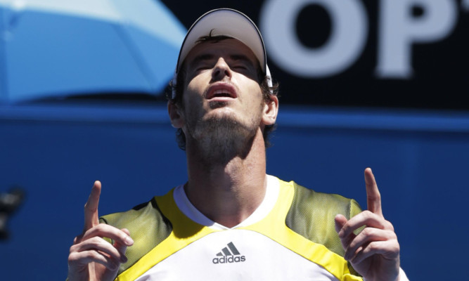 Murray celebrates after beating Haase - and the Australian heat.