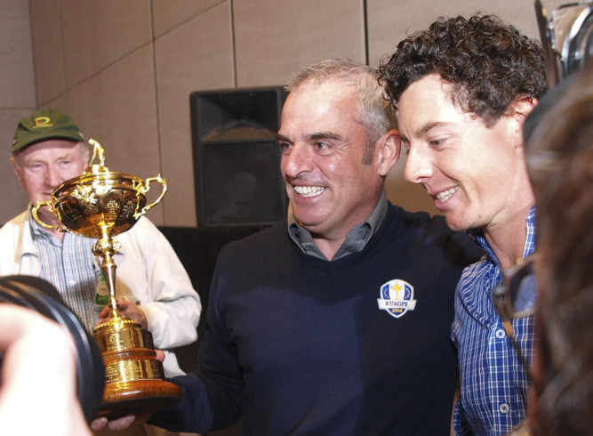 McIlroy (right) congratulates McGinley after he is nominated as captain.