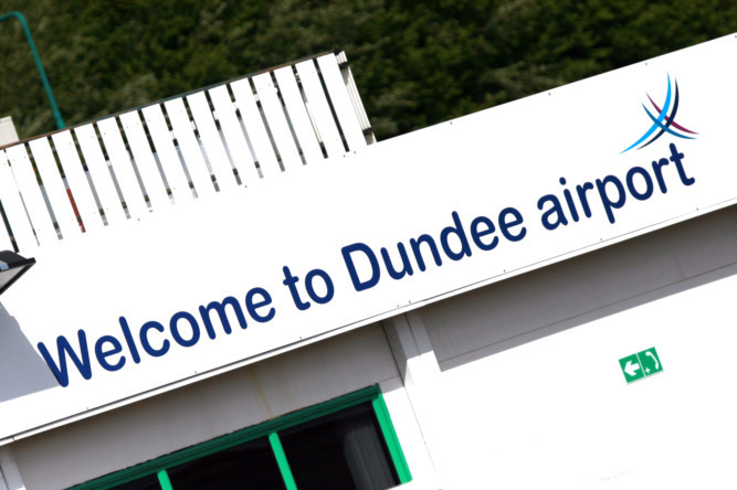 Kris Miller, Courier, 14/05/11. Picture today shows Welcome to Dundee Airport sign.
