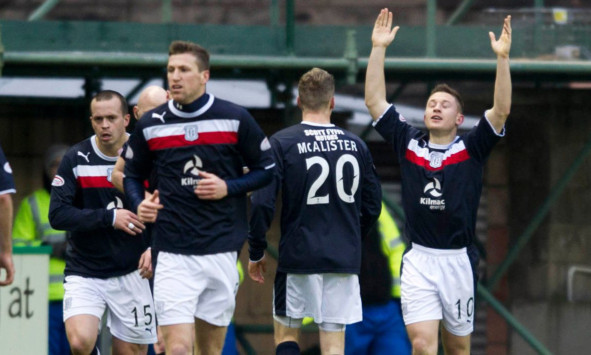 John Baird (right) celebrates after breaking the deadlock for Dundee.