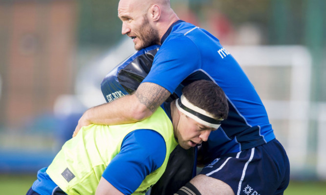 Scotland's Alistair Dickinson (left) tackles Alistair Strokosch during the Newcastle training.