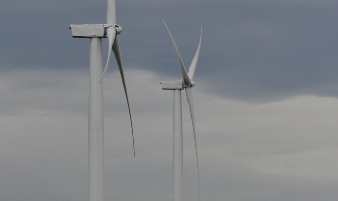 Kim Cessford - 06.11.12 - FOR FILE - pictured are two of the turbines in the wind farm next to Mossmorran, Fife showing an articulated lorry at it's base for scale