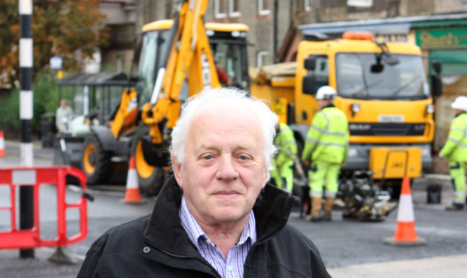 Councillor Jim Young at the junction where the crossing is being installed.