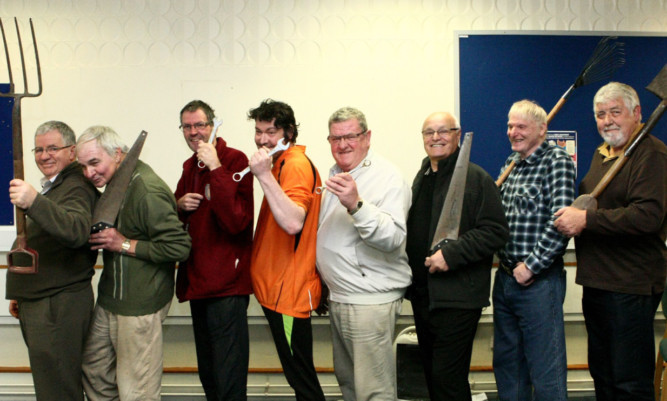 Some of the members of the Mens Shed at their meeting.