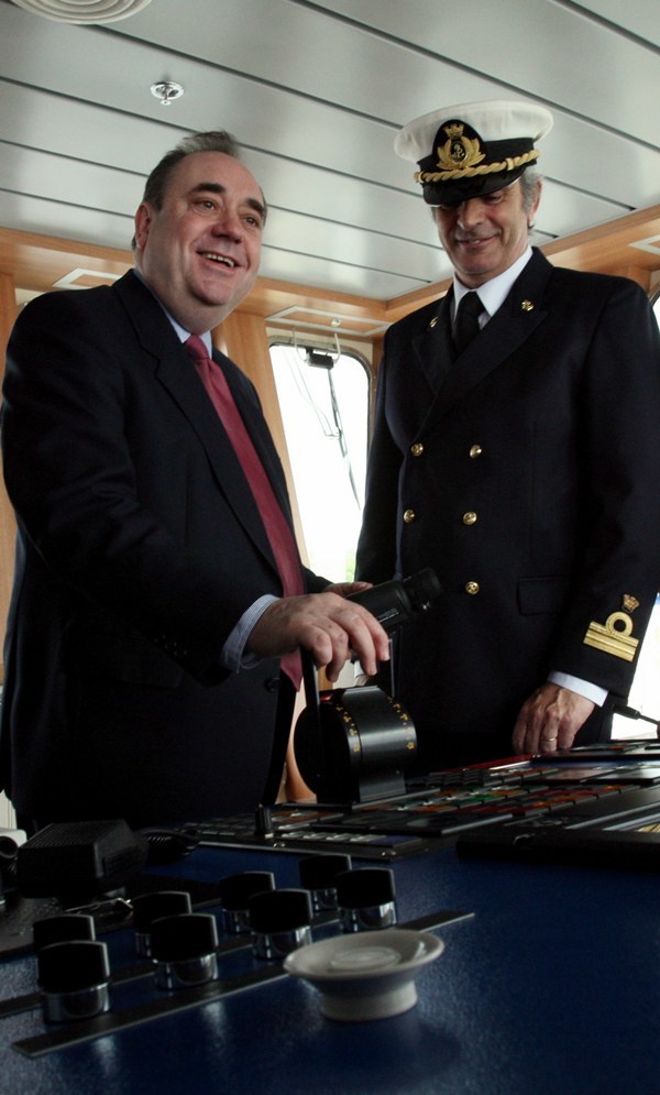 Rosyth ferry route reopens.    MV Scottish Viking, completes her maiden voyage to Rosyth.   L/r - Mr Charles Hammond, First Minister Alex Salmond, Captain Dominico Commisso and Mr Thomas Woldbye meet on the bridge of the ferry.