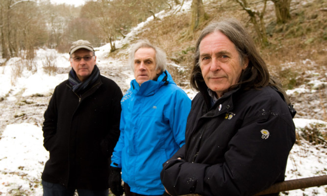 Concerned residents of Butterstone visit the site of the proposed hydro scheme. From left: Graham Rees, Bob Hester and musician Dougie MacLean.
