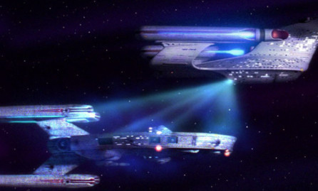 A scene from a Star Trek series showing a tractor beam.