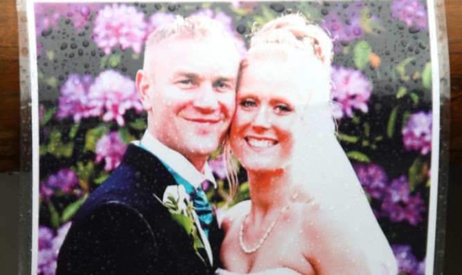 Tributes have been left to Ross and Clare Simons near where the couple died