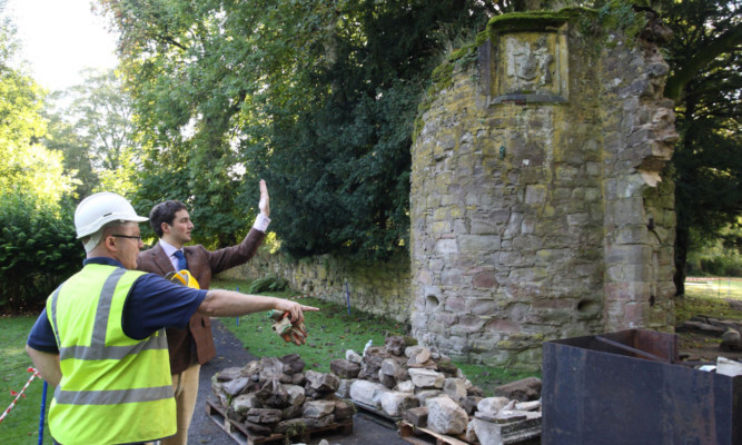 The respectable face of Graeme Malcolm  the stonemason discussing repairs to a 16th Century arch at Scone Palace with William Murray, master of Stormont.