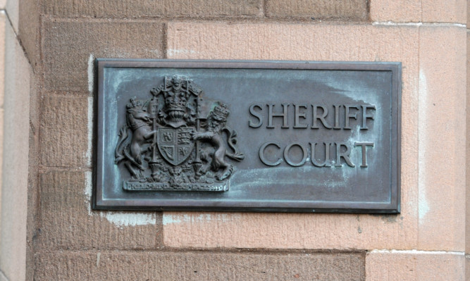 Kim Cessford - 03.05.12 - FOR FILE - pictured is the sign at Sheriff Court in Forfar