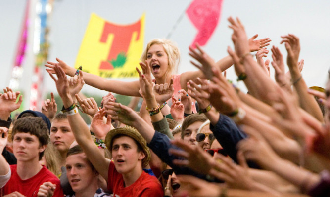 Crowds enjoying T in the Park's unique atmosphere.