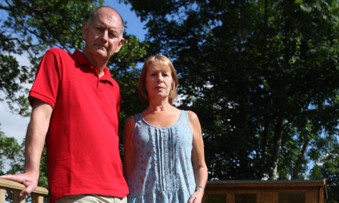 Villagers Gordon and Joy Treit's decking may have to be removed.