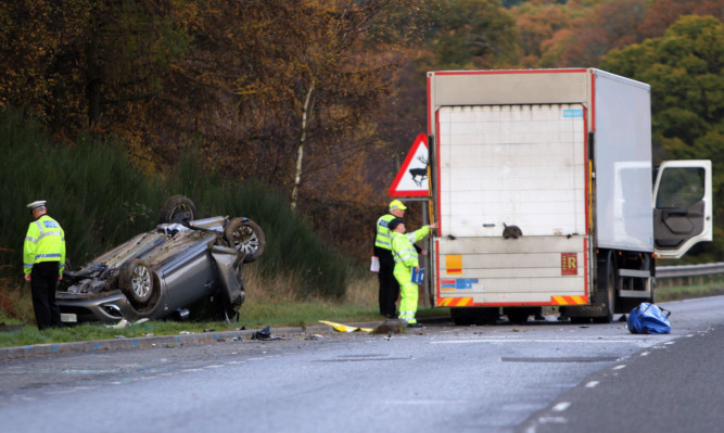 Police at the scene of the tragic crash.