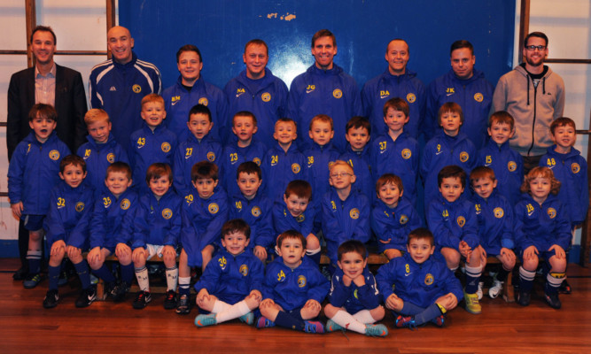 Football club Inverkeithing Hillfield Swifts sporting their new kit.