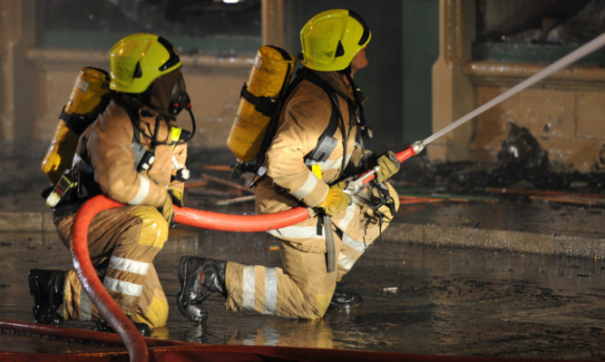 Kim Cessford - 03.01.13 - pictured is the scene of the fire in shops on Carnoustie High Street which engulfed The Carnoustie Country Larder, the Perfect Laundrette and The Grantie City Fish shops